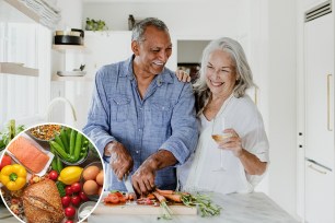 Elderly couple cooking in a kitchen