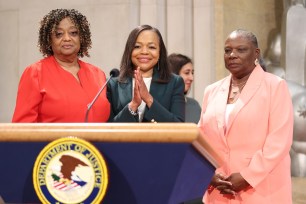 Gail Etienne, Assistant Attorney General for Civil Rights Kristen Clarke and Leona Tate attend the conclusion of the Brown v. Board of Education 70th Anniversary Commemoration at the Robert F. Kennedy Main Justice Building on May 14, 2024