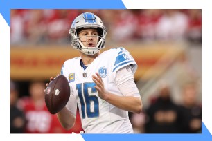 Detroit Lions quarterback Jared Goff drops back to throw a pass.