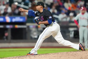 Edwin Diaz throws a pitch during the ninth inning of the Mets' 6-5 win over the Phillies in 11 innings.