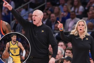 Rick Carlisle and Jenny Boucek coaching in a basketball game